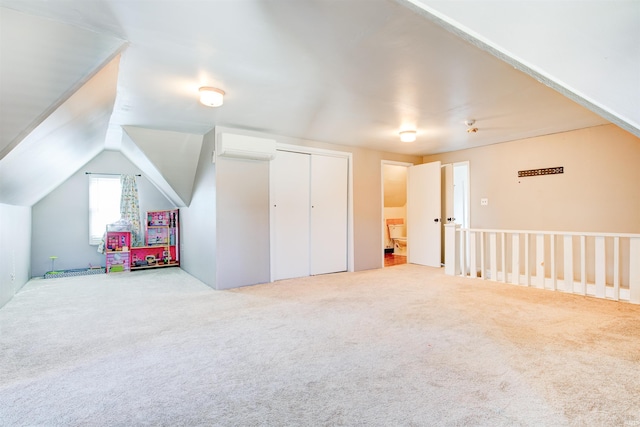 1409 Main St, Vincennes, IN 47591 - recreation room featuring a wall mounted AC, carpet floors, and lofted ceiling