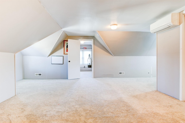 1409 Main St, Vincennes, IN 47591 - bonus room featuring carpet flooring, a wall mounted air conditioner, and lofted ceiling