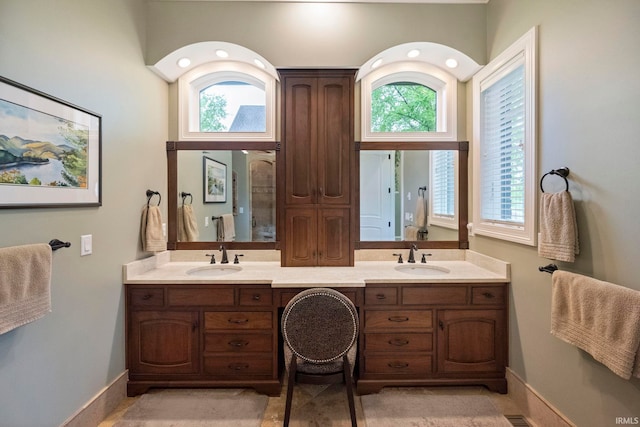 5198 Gardenia Ct, West Lafayette, IN 47906 - full bathroom with plenty of natural light, double vanity, and baseboards