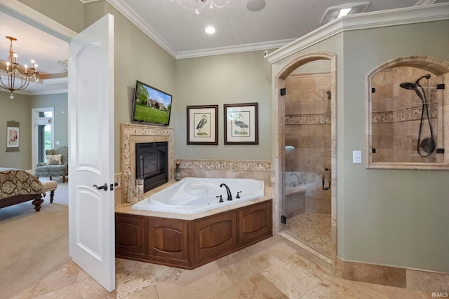 5198 Gardenia Ct, West Lafayette, IN 47906 - ensuite bathroom featuring a chandelier, ornamental molding, a stall shower, a glass covered fireplace, and a bath