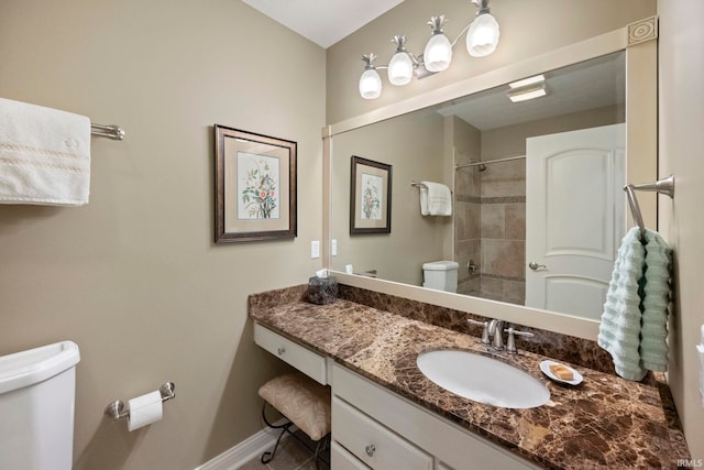5198 Gardenia Ct, West Lafayette, IN 47906 - bathroom with toilet, baseboards, a shower, and vanity