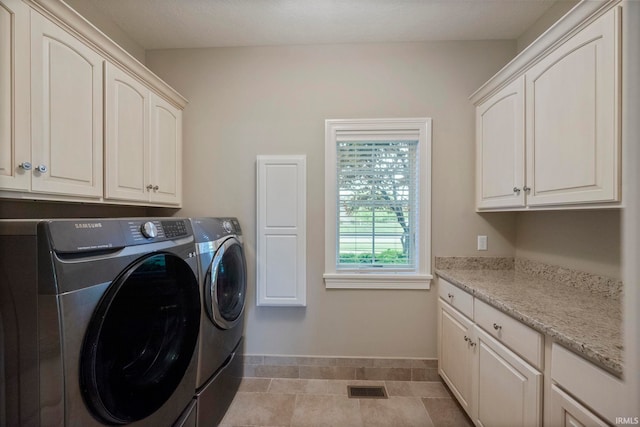 5198 Gardenia Ct, West Lafayette, IN 47906 - washroom with cabinet space, washer and clothes dryer, and baseboards
