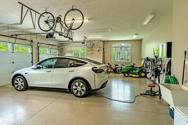 5198 Gardenia Ct, West Lafayette, IN 47906 - garage featuring a garage door opener