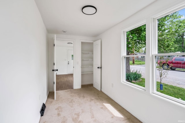 516 W Pike St, Warsaw, IN 46580 - unfurnished bedroom featuring light carpet and baseboards