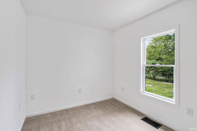 516 W Pike St, Warsaw, IN 46580 - unfurnished room featuring baseboards and light carpet