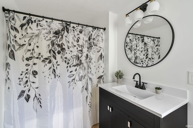 516 W Pike St, Warsaw, IN 46580 - bathroom featuring vanity and a shower with curtain