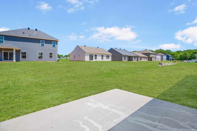 2934 Tipperary Dr, Evansville, IN 47725 - view of grassy yard with a patio area and a residential view