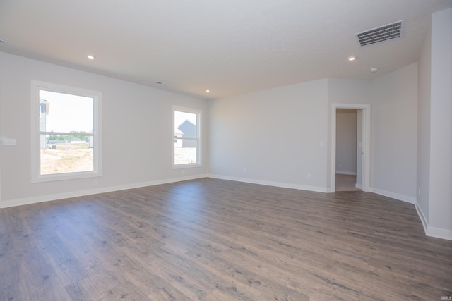 2934 Tipperary Dr, Evansville, IN 47725 - unfurnished room with healthy amount of natural light, wood finished floors, baseboards, and recessed lighting