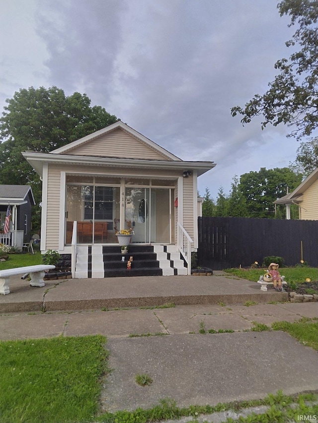 418 Watt St, Jeffersonville, IN 47130 - view of front of home featuring fence and a porch