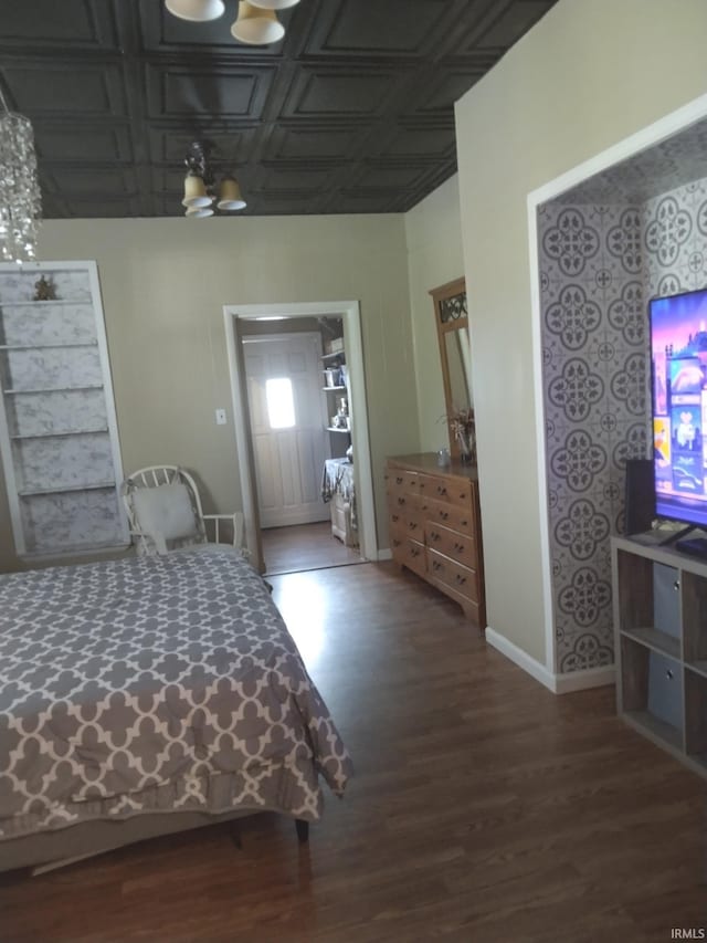 418 Watt St, Jeffersonville, IN 47130 - bedroom featuring an ornate ceiling, wood finished floors, and baseboards