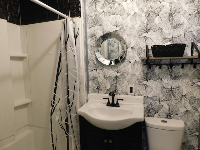 418 Watt St, Jeffersonville, IN 47130 - bathroom with wallpapered walls, toilet, and vanity