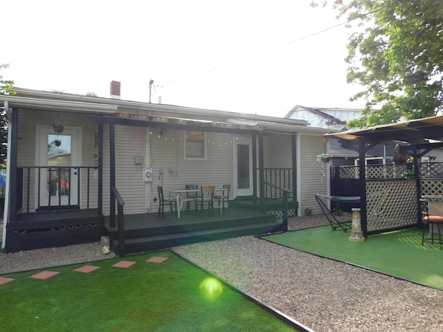 418 Watt St, Jeffersonville, IN 47130 - rear view of house with a porch
