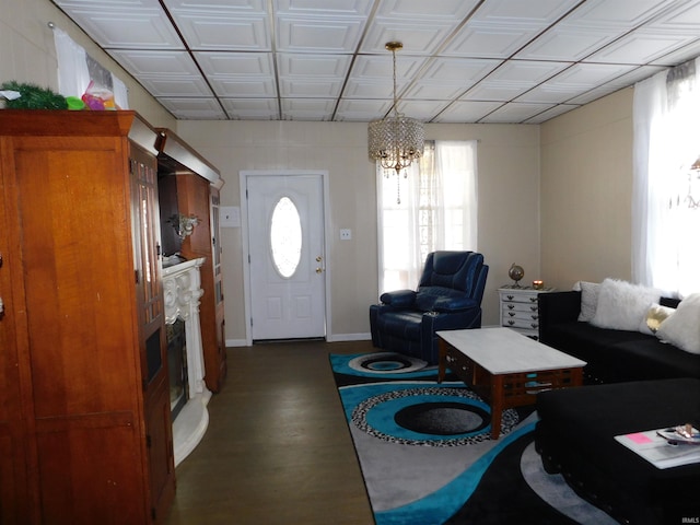 418 Watt St, Jeffersonville, IN 47130 - living room with a chandelier, wood finished floors, and a fireplace