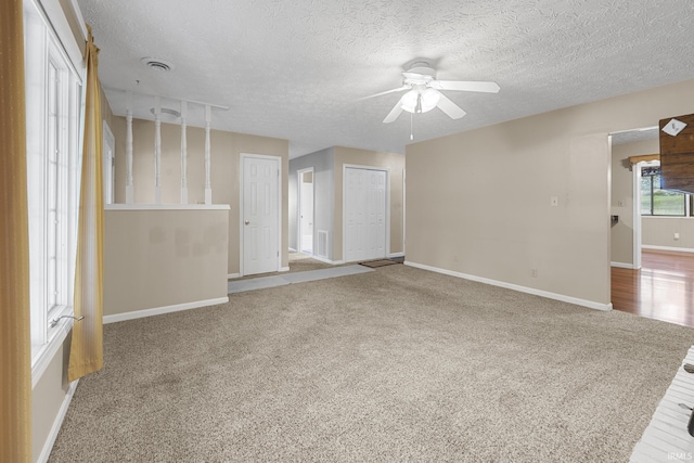 541 Genevieve Ave, Jasper, IN 47546 - carpeted empty room featuring a ceiling fan, baseboards, and a textured ceiling