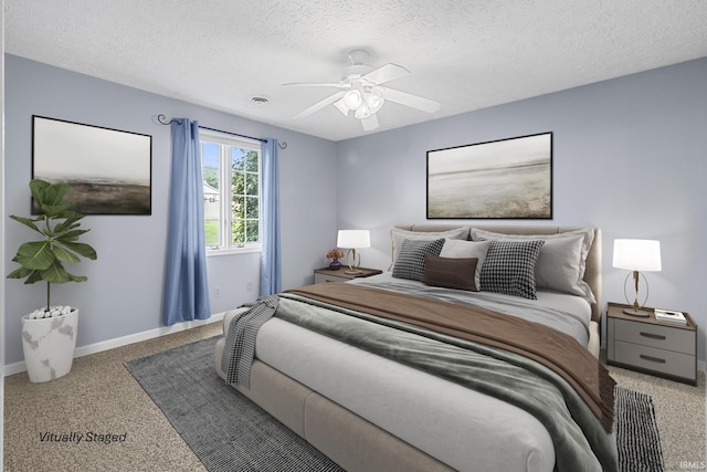 541 Genevieve Ave, Jasper, IN 47546 - carpeted bedroom with baseboards, a textured ceiling, and ceiling fan