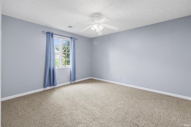 541 Genevieve Ave, Jasper, IN 47546 - spare room featuring carpet flooring, a textured ceiling, a ceiling fan, and baseboards