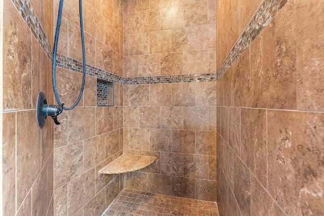 bathroom view of tiled shower