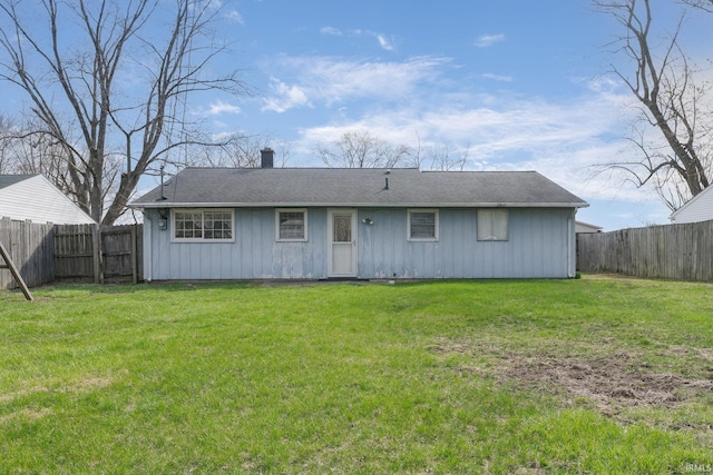 5621 Council Ring Blvd, Kokomo, IN 46902 - rear view of property featuring board and batten siding and a chimney