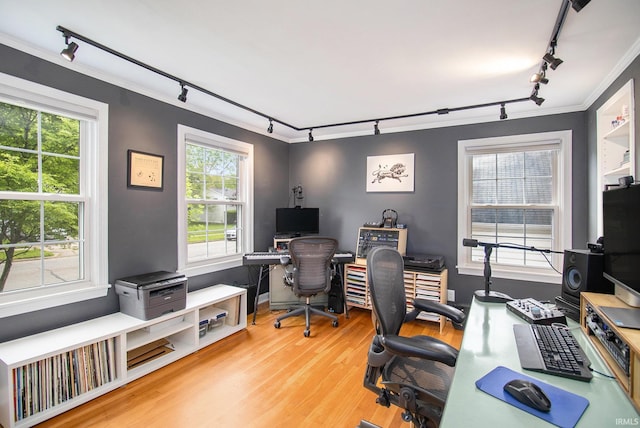 423 N Esther St, South Bend, IN 46617 - office area with rail lighting, wood finished floors, and ornamental molding