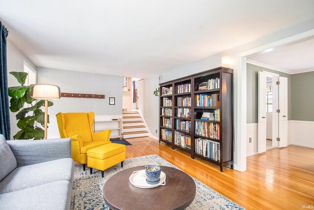 423 N Esther St, South Bend, IN 46617 - living area featuring wood finished floors, stairway, and crown molding