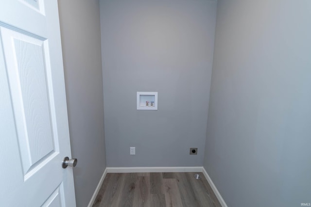3214 Burr Oak Ave, Elkhart, IN 46517 - clothes washing area featuring hookup for an electric dryer, hookup for a washing machine, wood finished floors, and baseboards