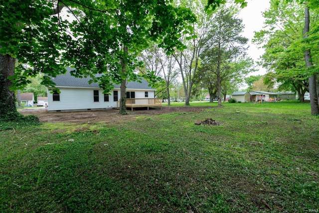3214 Burr Oak Ave, Elkhart, IN 46517 - view of grassy yard featuring a wooden deck