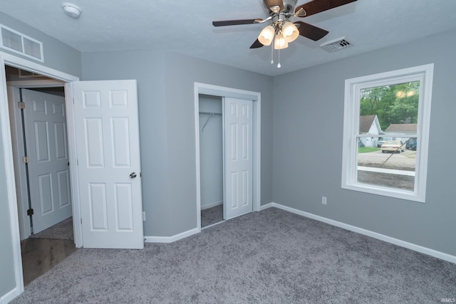 3214 Burr Oak Ave, Elkhart, IN 46517 - unfurnished bedroom featuring carpet floors, baseboards, a closet, and ceiling fan