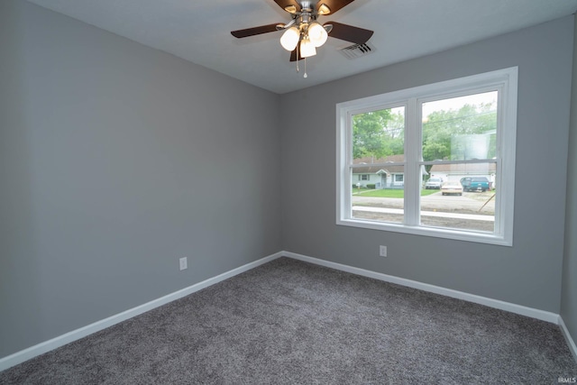3214 Burr Oak Ave, Elkhart, IN 46517 - empty room featuring baseboards, carpet floors, and ceiling fan