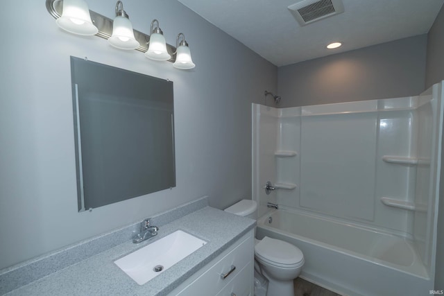 3214 Burr Oak Ave, Elkhart, IN 46517 - bathroom featuring toilet, vanity, and bathtub / shower combination