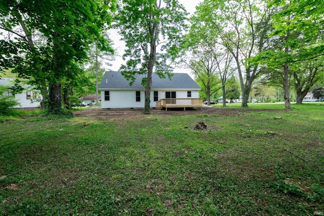 3214 Burr Oak Ave, Elkhart, IN 46517 - view of grassy yard with a wooden deck