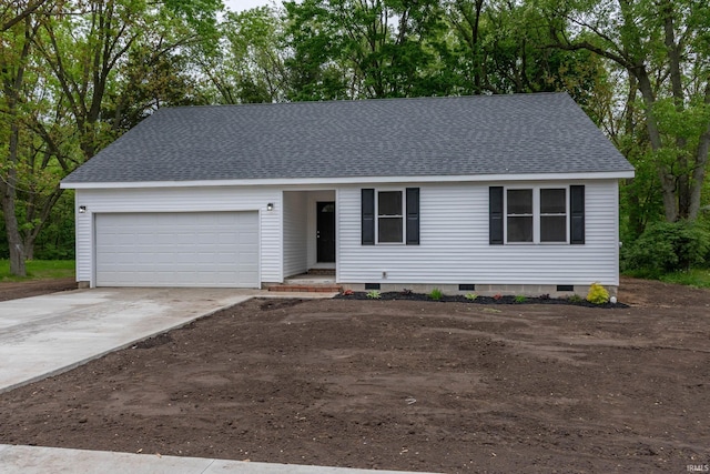 3214 Burr Oak Ave, Elkhart, IN 46517 - view of front of house with crawl space, a shingled roof, driveway, and an attached garage