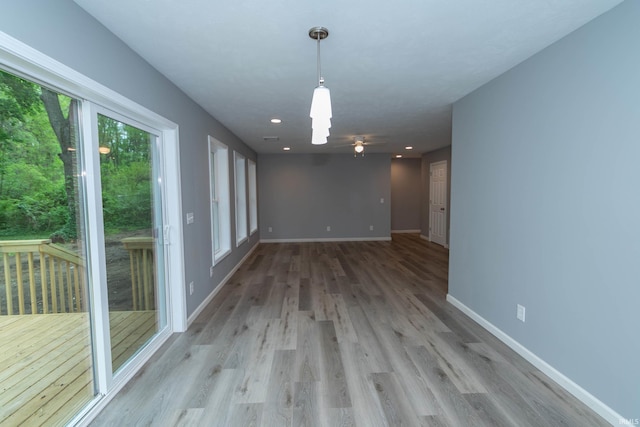 3214 Burr Oak Ave, Elkhart, IN 46517 - empty room featuring light wood-style flooring, baseboards, recessed lighting, and ceiling fan