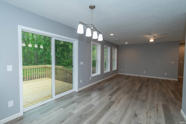 3214 Burr Oak Ave, Elkhart, IN 46517 - unfurnished room with wood finished floors, baseboards, a ceiling fan, and recessed lighting