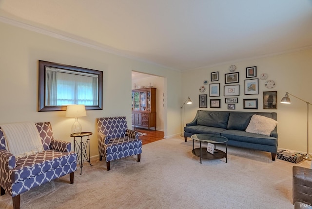 living room featuring ornamental molding, carpet floors, and baseboards