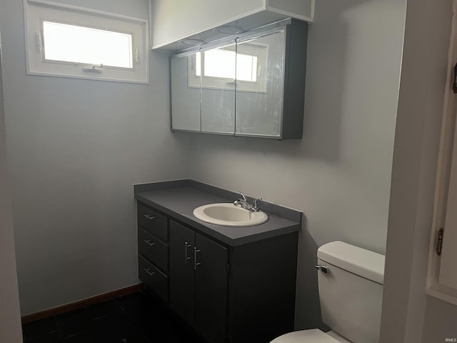 half bath with toilet and vanity