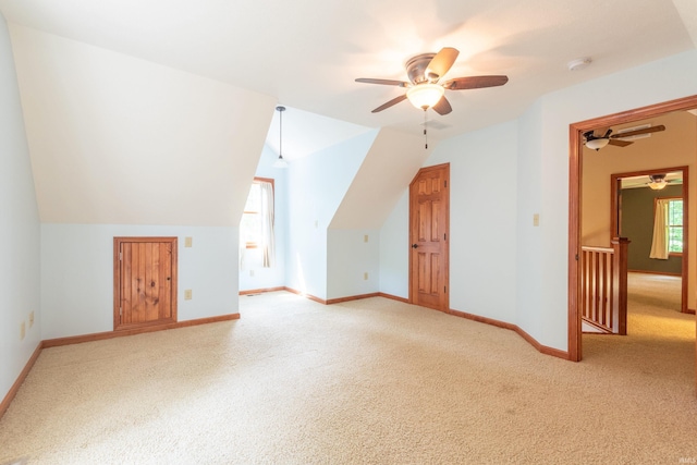 6015 E State Road 46, Bloomington, IN 47401 - bonus room with a ceiling fan, light colored carpet, baseboards, and vaulted ceiling