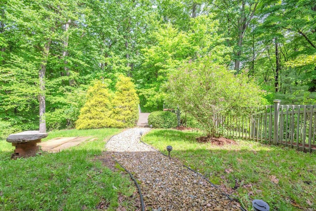 6015 E State Road 46, Bloomington, IN 47401 - view of yard with fence and a wooded view