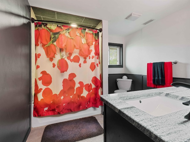 4038 Fahlsing Rd, Woodburn, IN 46797 - bathroom with shower / bath combination with curtain, tile patterned flooring, toilet, and vanity