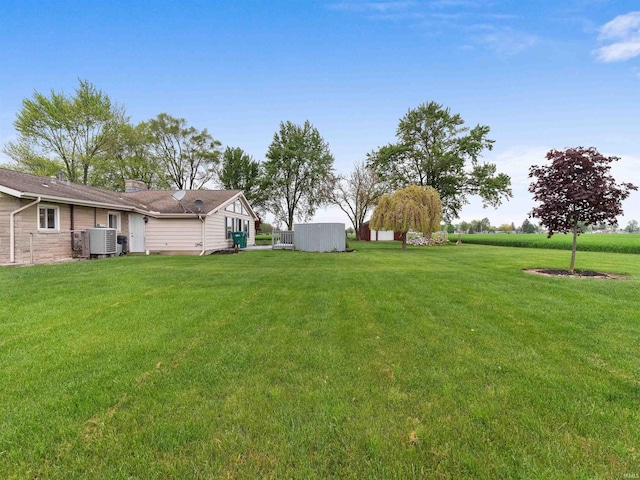 4038 Fahlsing Rd, Woodburn, IN 46797 - view of green lawn featuring central air condition unit