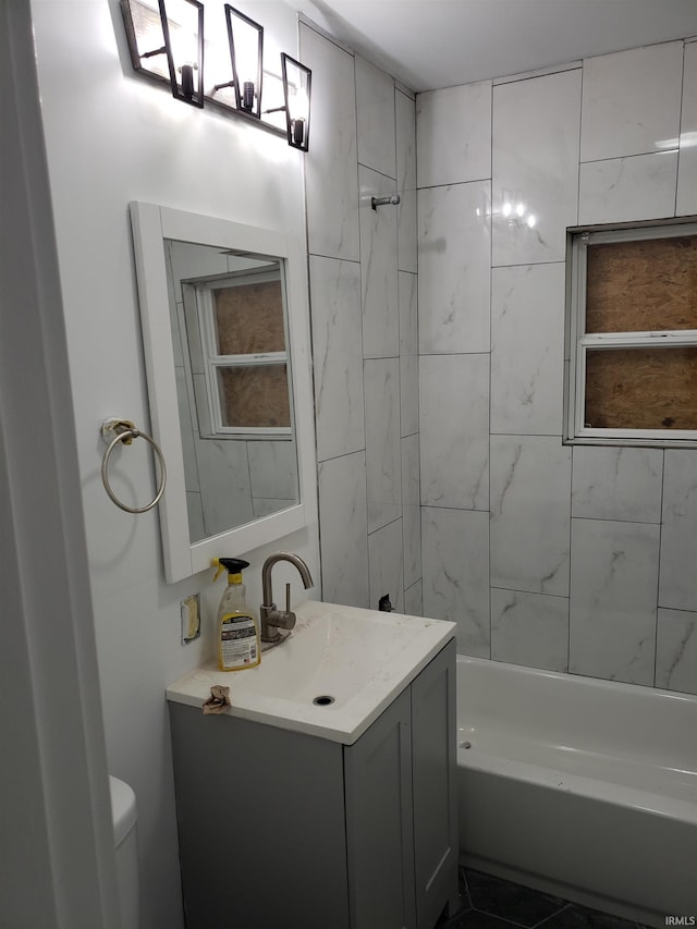 3644 N Parker Ave, Indianapolis, IN 46218 - full bathroom with toilet, vanity, and bathing tub / shower combination