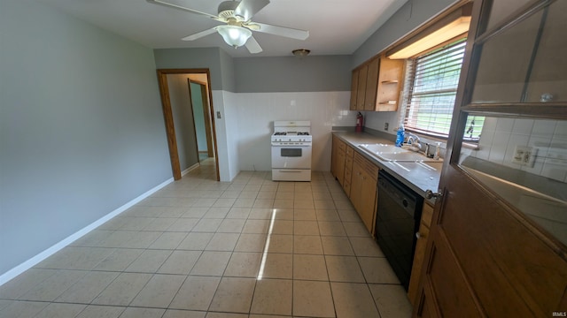 kitchen featuring black dishwasher, gas range gas stove, a sink, open shelves, and a ceiling fan