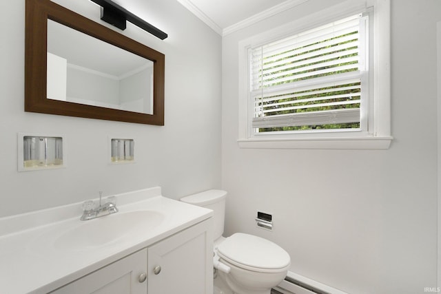 bathroom with ornamental molding, vanity, toilet, and a baseboard heating unit