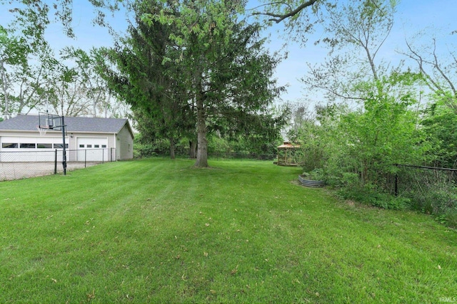 view of yard with a garage