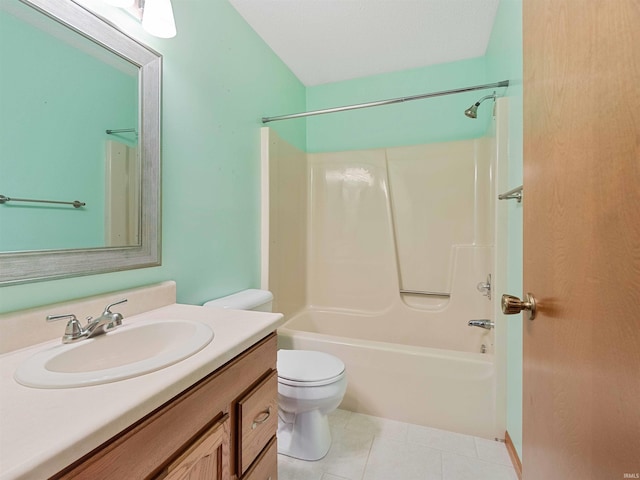 full bath with toilet, vanity, tile patterned floors, and shower / tub combination