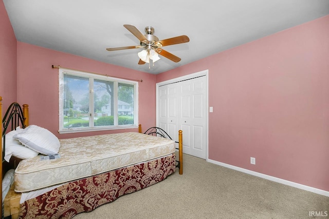 3016 S E Lake Dr, Elkhart, IN 46514 - bedroom with a closet, carpet, baseboards, and a ceiling fan