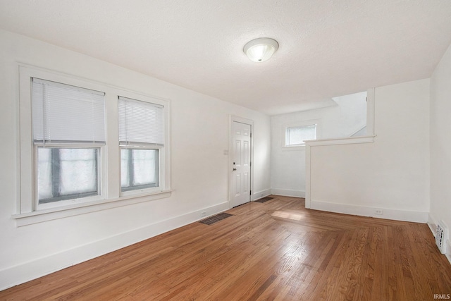 241 E Fairview Ave, South Bend, IN 46614 - foyer entrance featuring baseboards and light wood finished floors