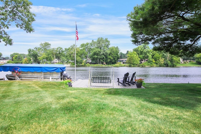 22147 Sunset Ln, Elkhart, IN 46516 - view of green lawn featuring a water view and a dock