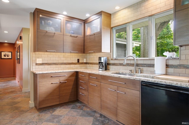 22147 Sunset Ln, Elkhart, IN 46516 - kitchen featuring black dishwasher, tasteful backsplash, dark stone finish floors, plenty of natural light, and recessed lighting