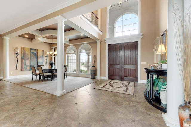 6482 Hollopeter Rd, Leo, IN 46765 - foyer with ornate columns, a chandelier, baseboards, a high ceiling, and coffered ceiling