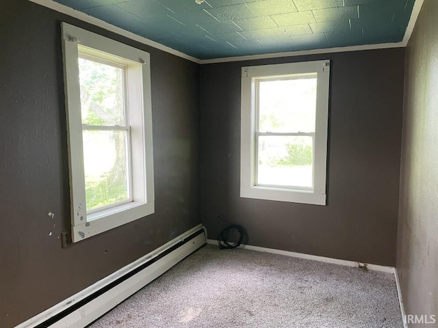 251 N Snowden St, Andrews, IN 46702 - empty room with baseboard heating, carpet, baseboards, and ornamental molding